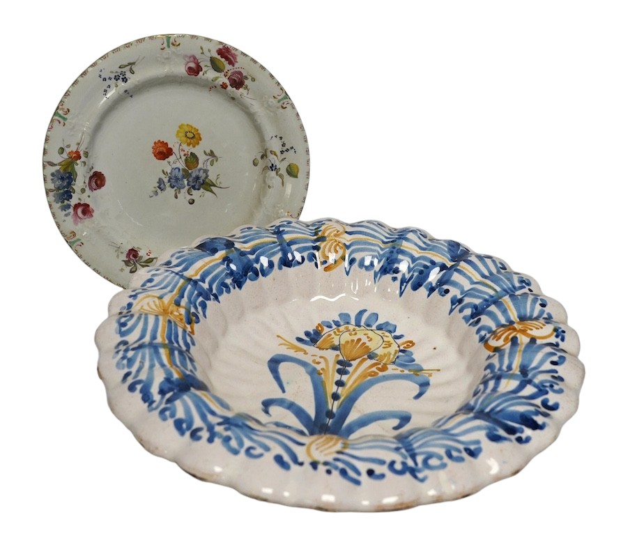 An Italian maiolica dish and a Masons Ironstone floral plate, largest 30cm in diameter (2). Condition - fair